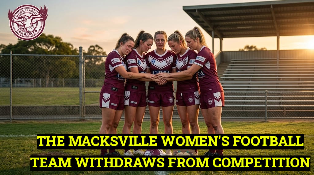 A poignant photograph taken at golden hour on a grassy footy oval of five tearful female players in maroon and white Macksville Sea Eagles jerseys. The women are locked in an emotional huddle, holding hands and grieving together. On the turf in the foreground is a maroon helmet and a commemorative plaque. The background shows empty grandstands. Text overlay states: 'The Macksville women's football team withdraws from competition.