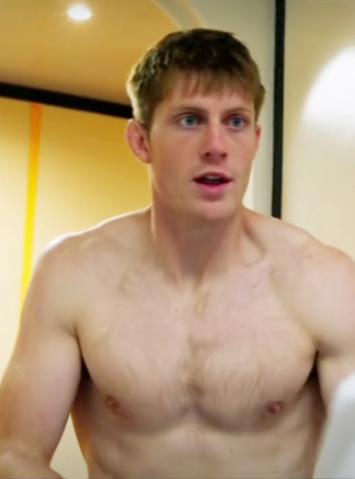 Peter Claffey shirtless showing his upper body mass during training