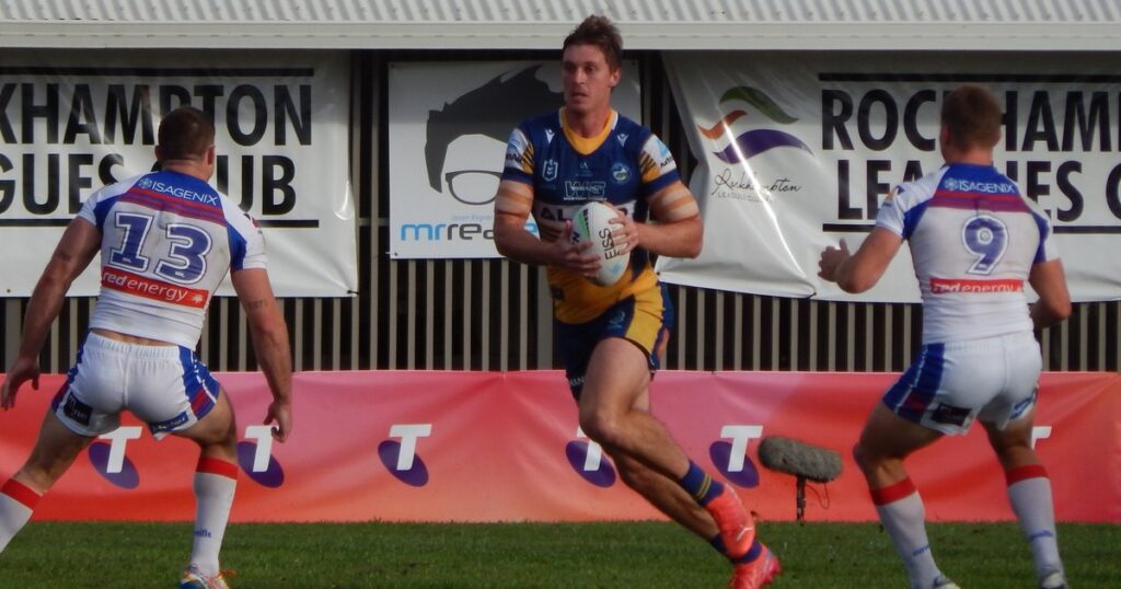 Newcastle Knights players in defence during a finals match against Parramatta
