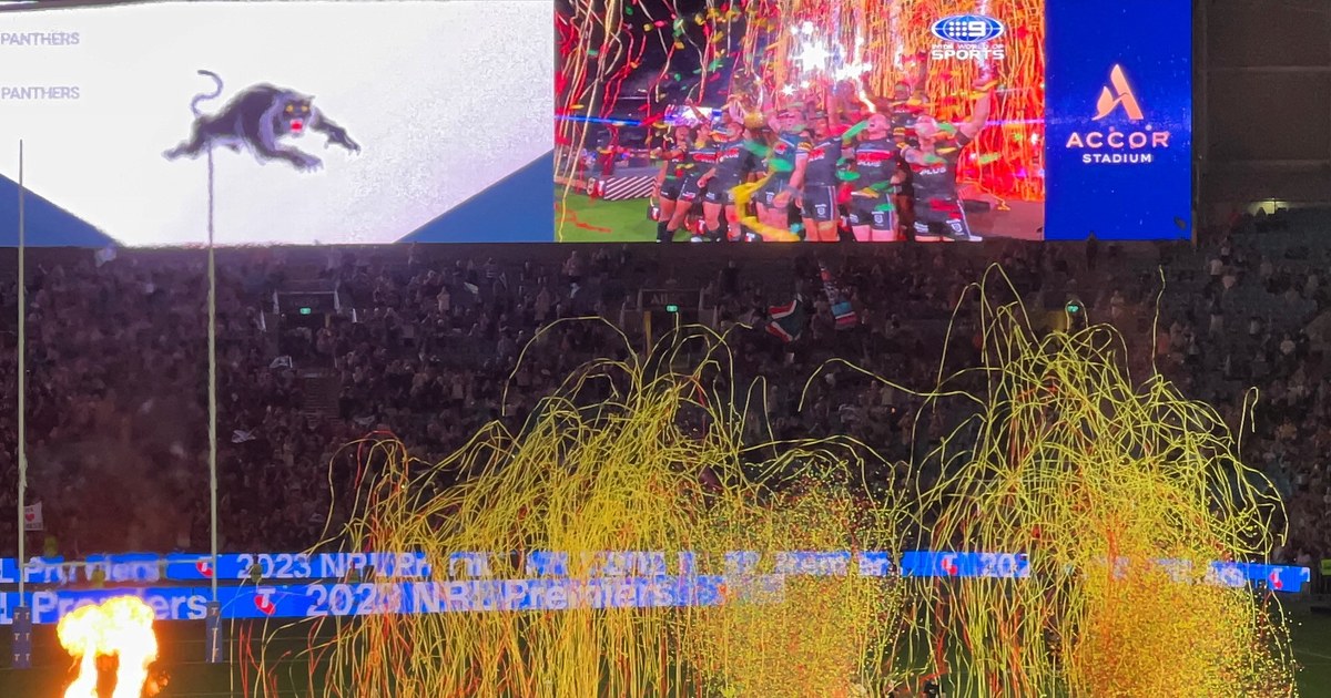 Penrith Panthers celebrate their 2023 NRL premiership with pyrotechnics and streamers at Accor Stadium