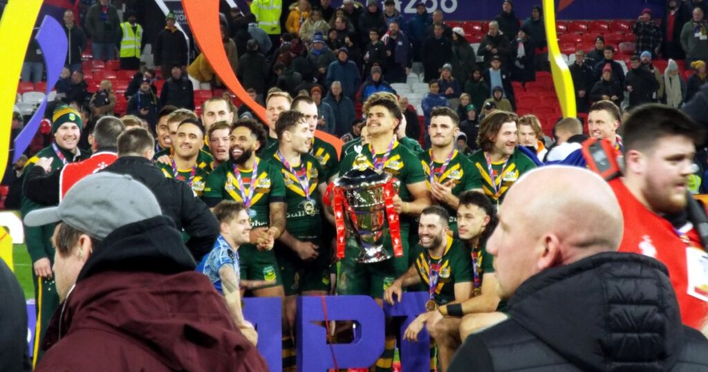 Australia's Kangaroos celebrate with the trophy after winning the 2021 Rugby League World Cup