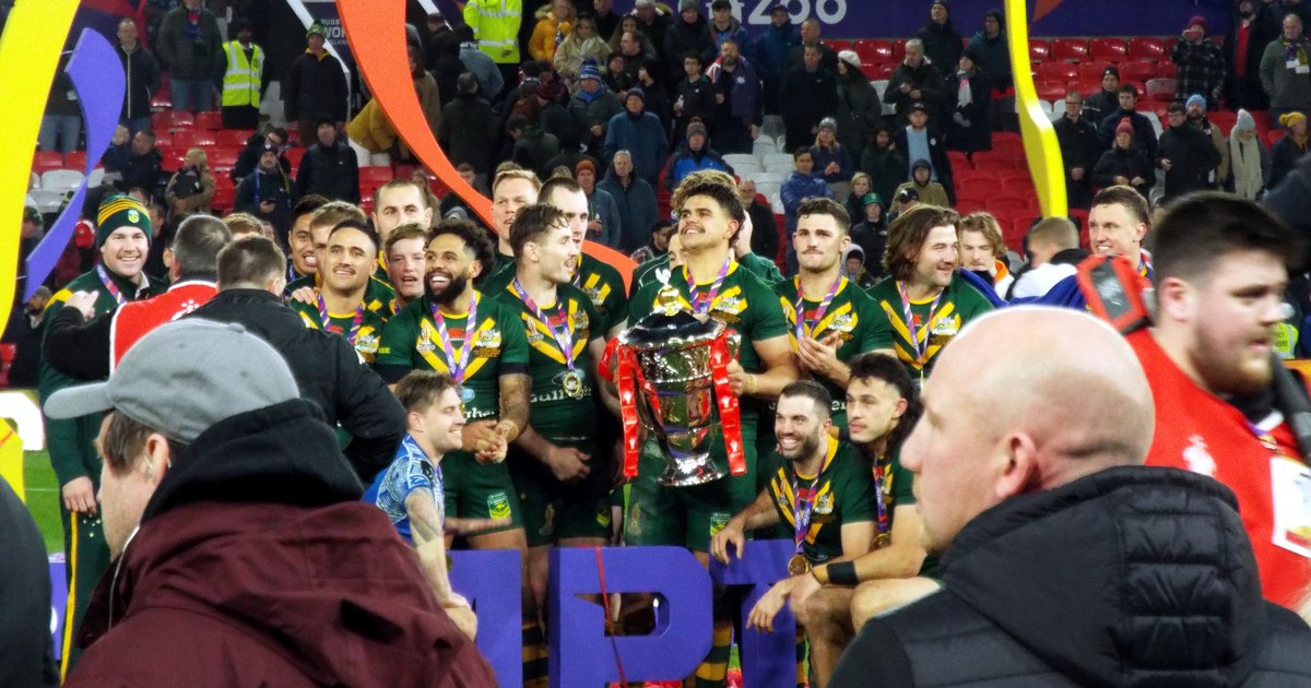 Australia's Kangaroos celebrate with the trophy after winning the 2021 Rugby League World Cup