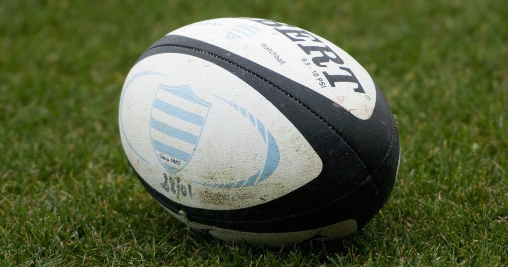 A rugby ball on grass