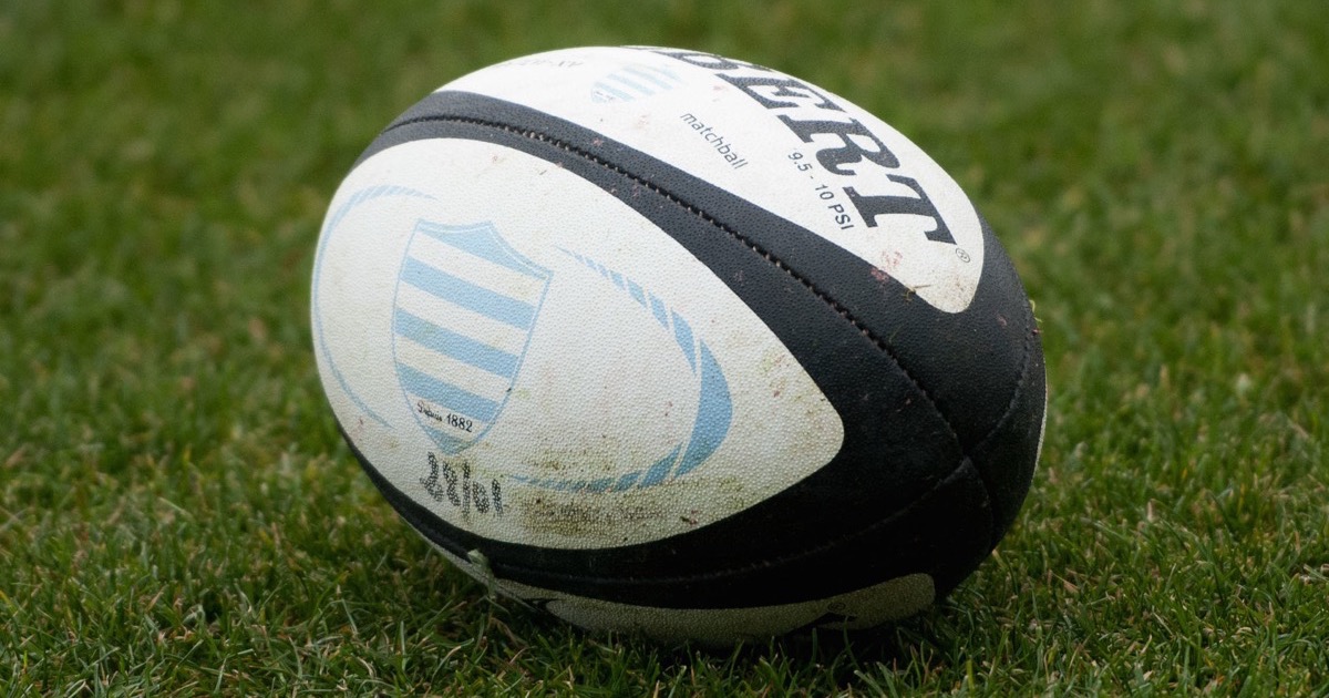 A rugby ball on grass