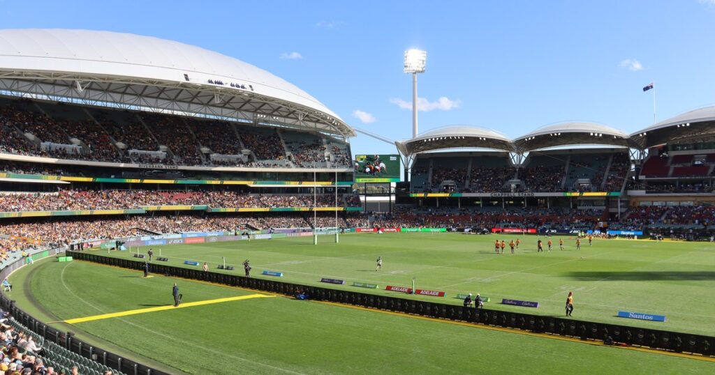 The Wallabies warm up in front of a packed crowd at Adelaide Oval before a Rugby Championship match