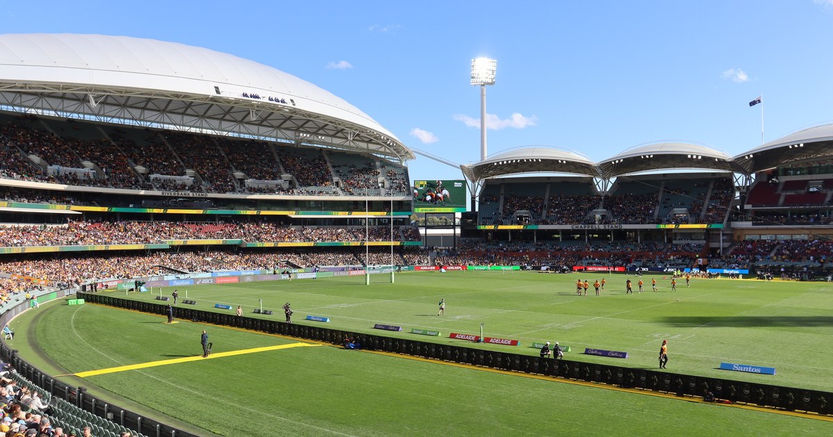 The Wallabies warm up in front of a packed crowd at Adelaide Oval before a Rugby Championship match