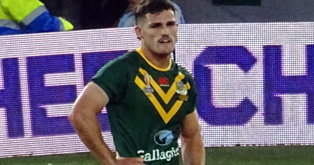 Nathan Cleary standing with hands on hips in the Australian Kangaroos jersey