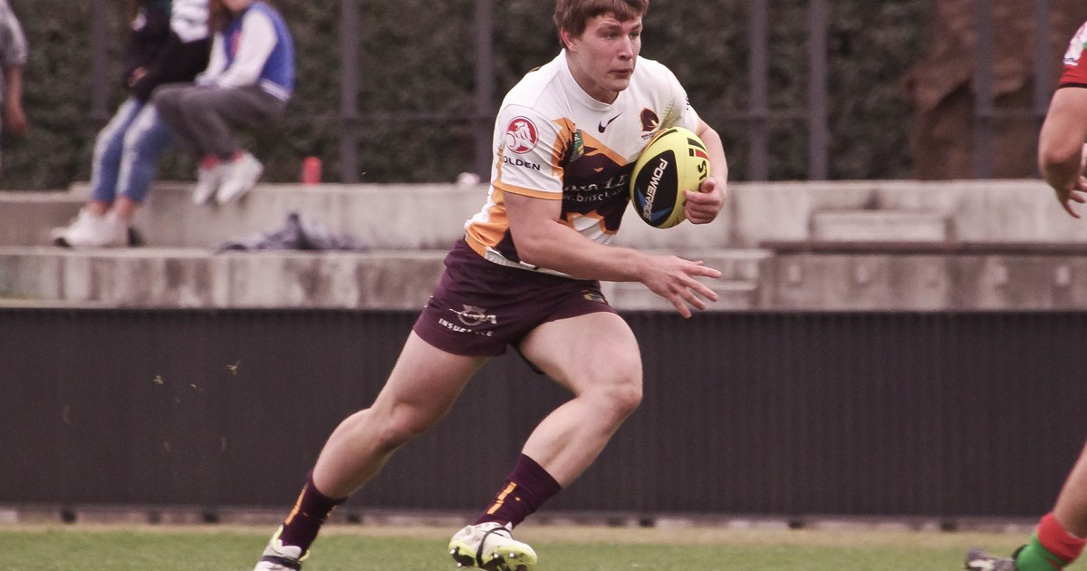 Jai Arrow running with the ball in Brisbane Broncos colours in 2014