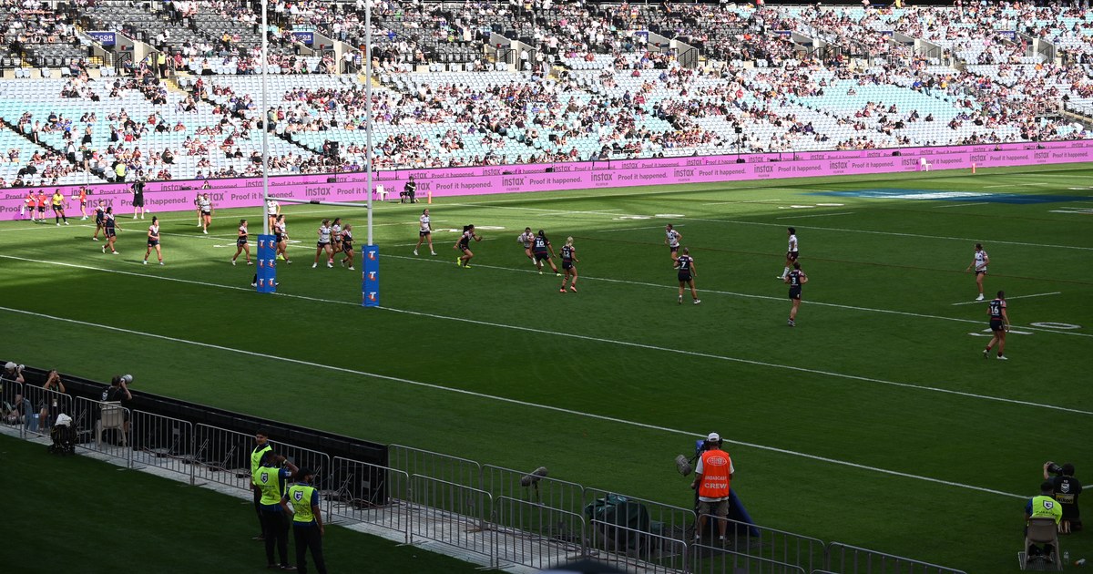 Wide view of an NRLW grand final in play at Accor Stadium