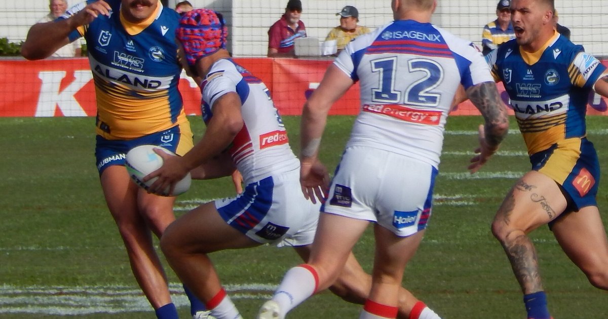 Kalyn Ponga in a Newcastle Knights jersey and headgear during a match against Parramatta