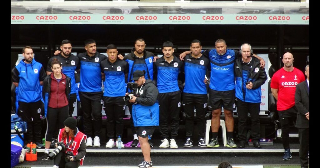 The Samoa rugby league squad standing together before a World Cup match