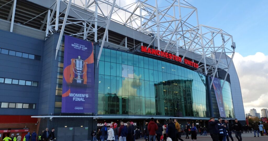 The exterior of Old Trafford with Rugby League World Cup final banners