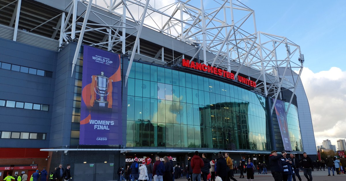 The exterior of Old Trafford with Rugby League World Cup final banners