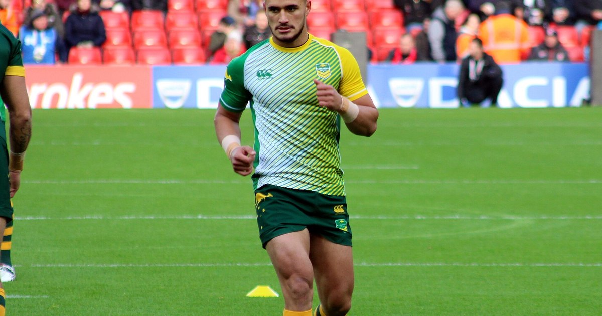 Valentine Holmes in a green and gold Australia training top on the field before a Test